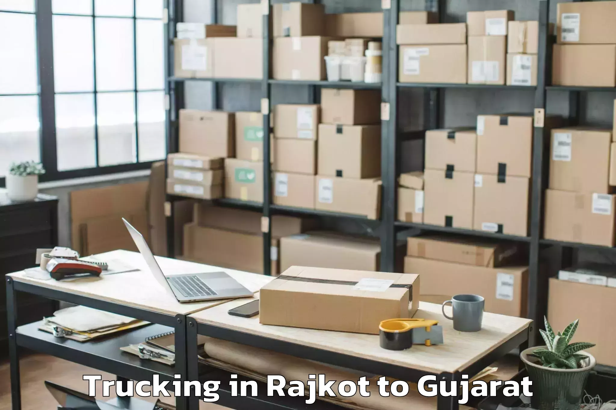 Professional Rajkot to Vansda Trucking